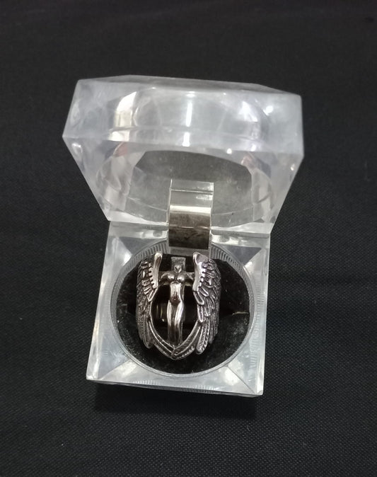 Steel ring with crucified angel