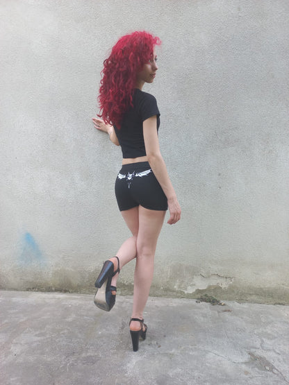 Hot pants in cotone nero con stampa pipistrello